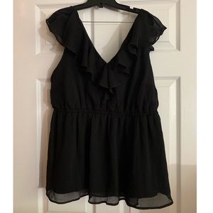 Black chiffon babydoll shirt with ruffles.